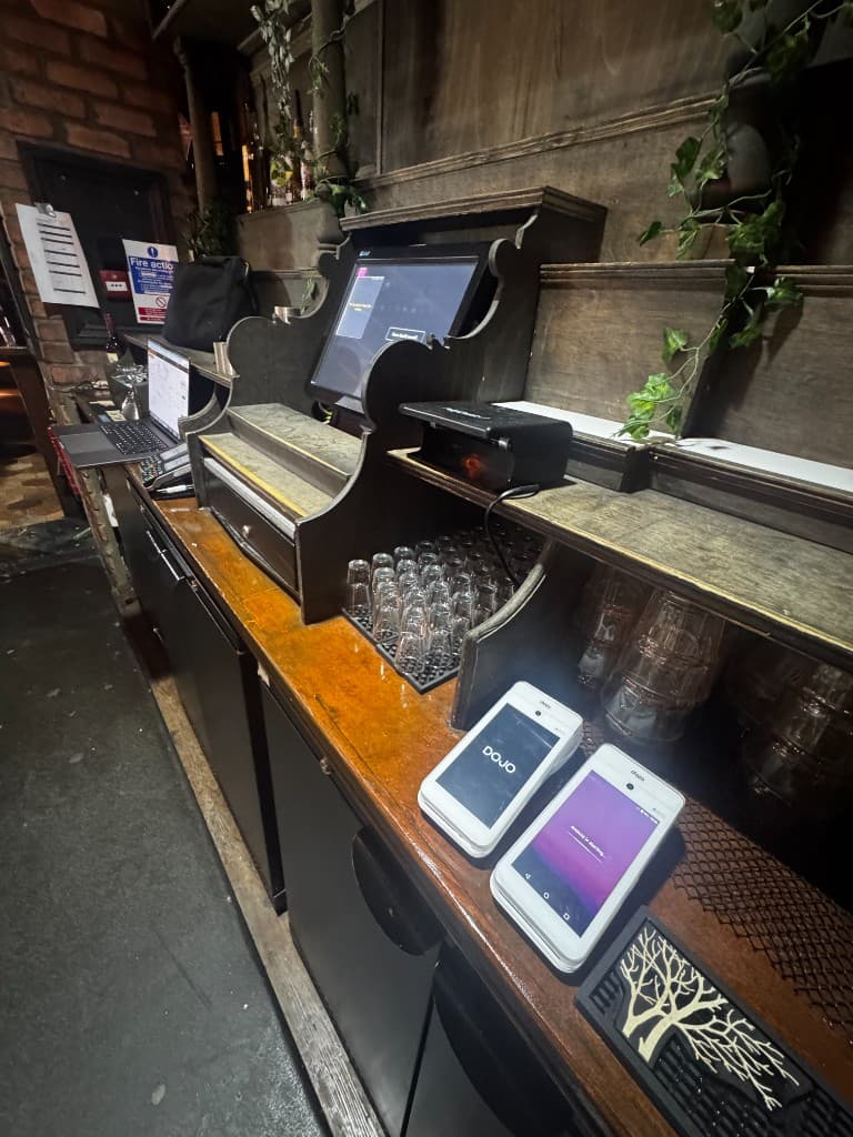 Dojo terminals on a bar counter